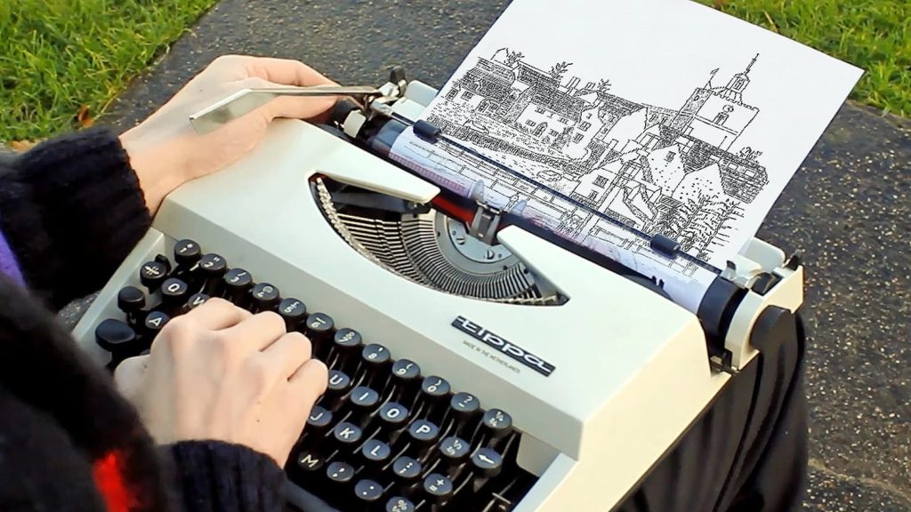 20th december 2019 artist james cook works on location creating typewriter art of finchingfield es