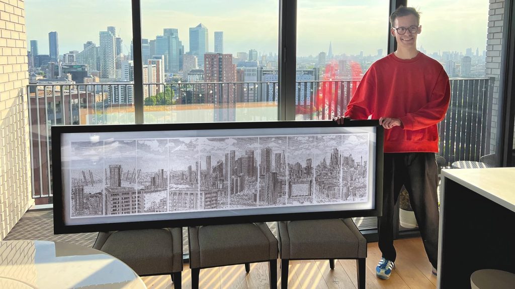 6th june 2022 artist james cook stands with his largest typewriter art of the london skyline